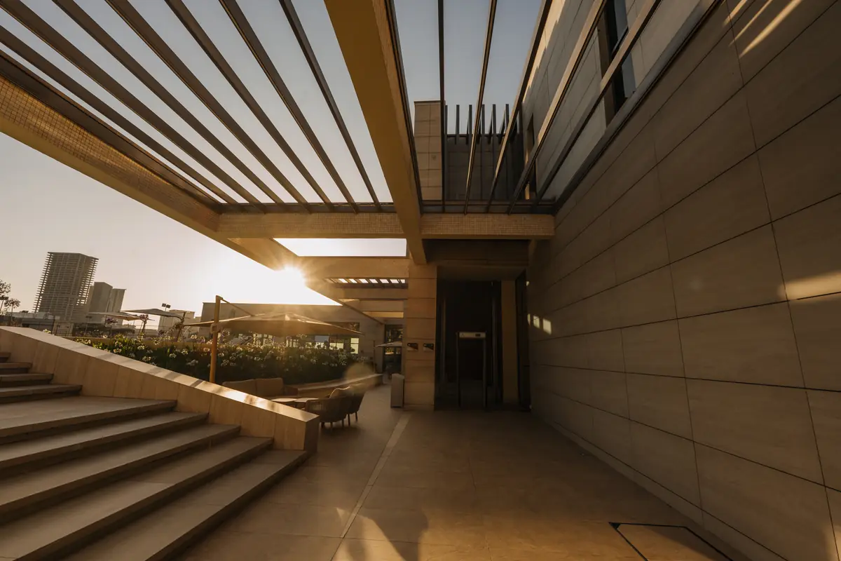 Sunlit terrace arrival at Minab